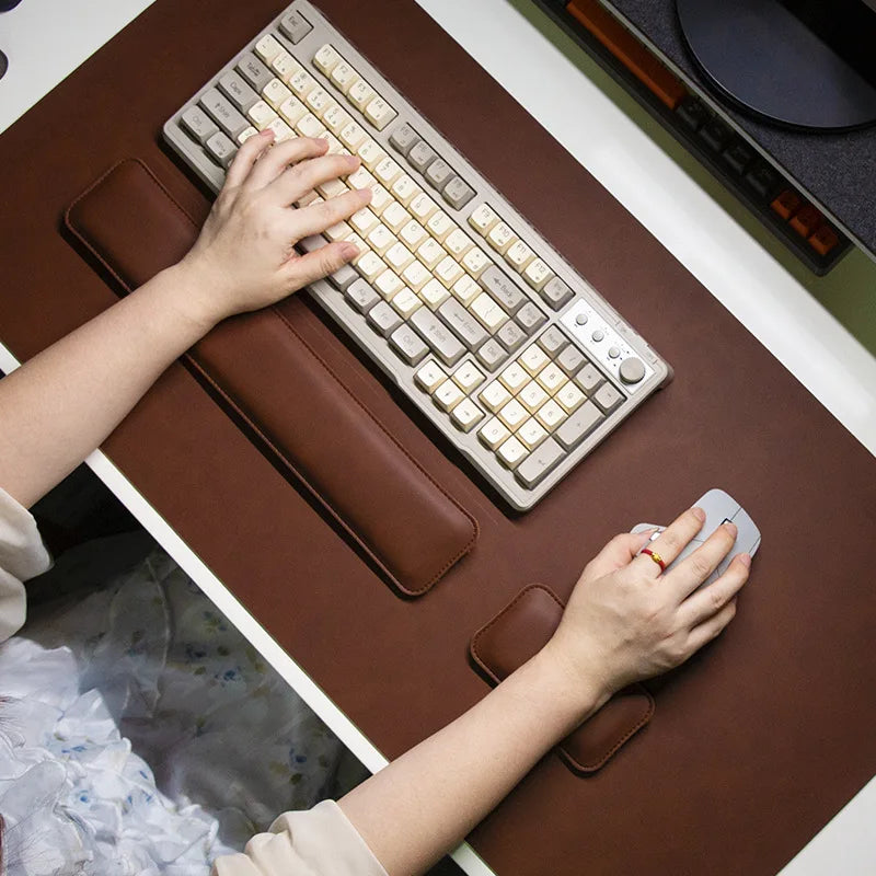 MobilityBuy.com brown PU leather three-piece desk mat set: large desk mat, keyboard wrist rest, and mouse pad.